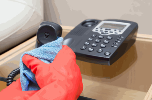 Dusting is necessary to ensure a clean office building and healthy work environment